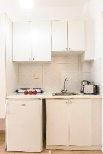 Izba s kuchynským kútom