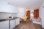 Apartmán Superior - kuchynský kút s obývacou časťou